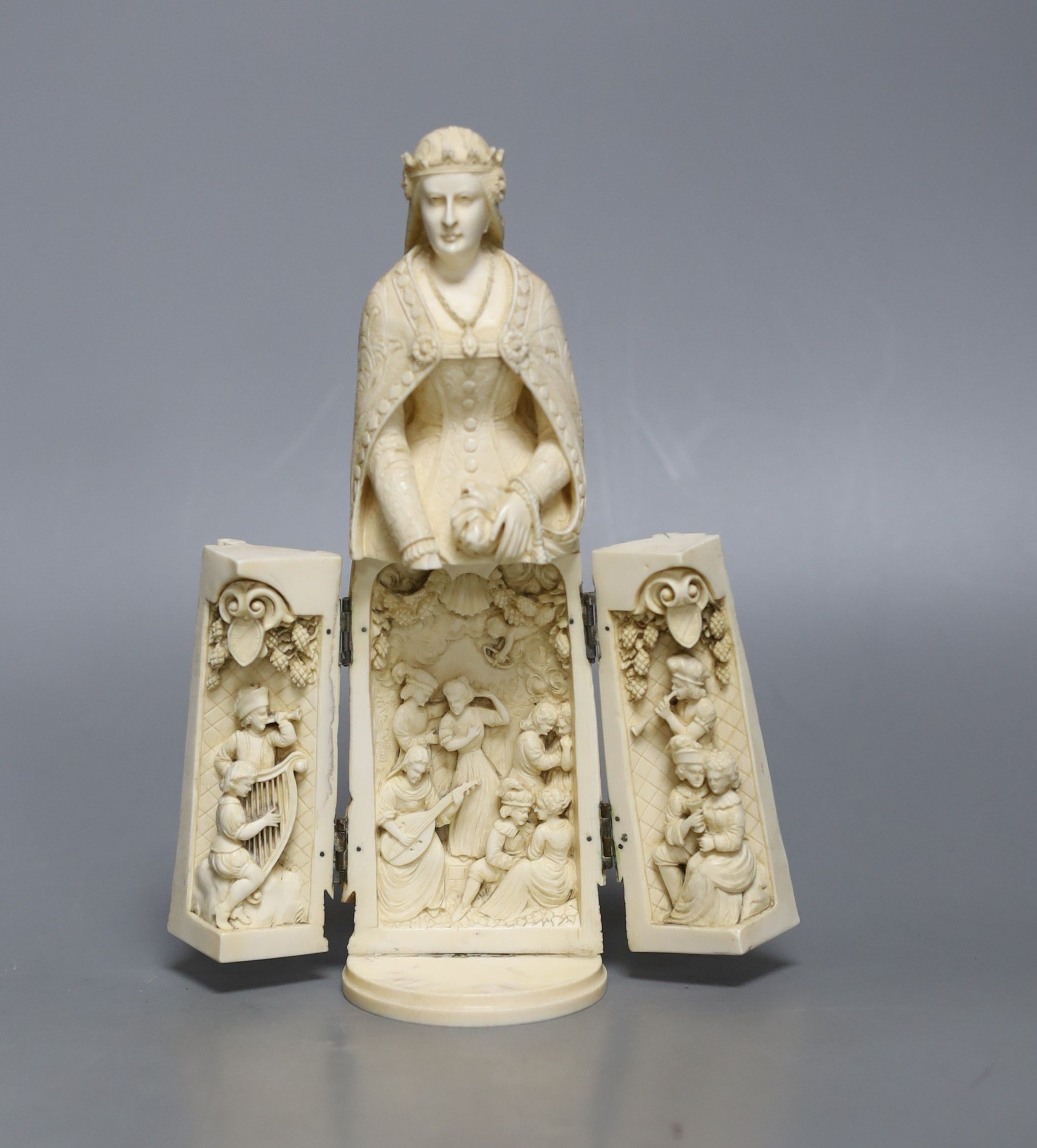 A late 19th century Dieppe ivory triptych figure of Eleanor of Aquitaine, 20cm 21 cm high